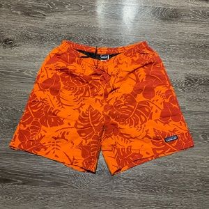 mens orange Patagonia floral swim trunks shorts size medium Flat front.